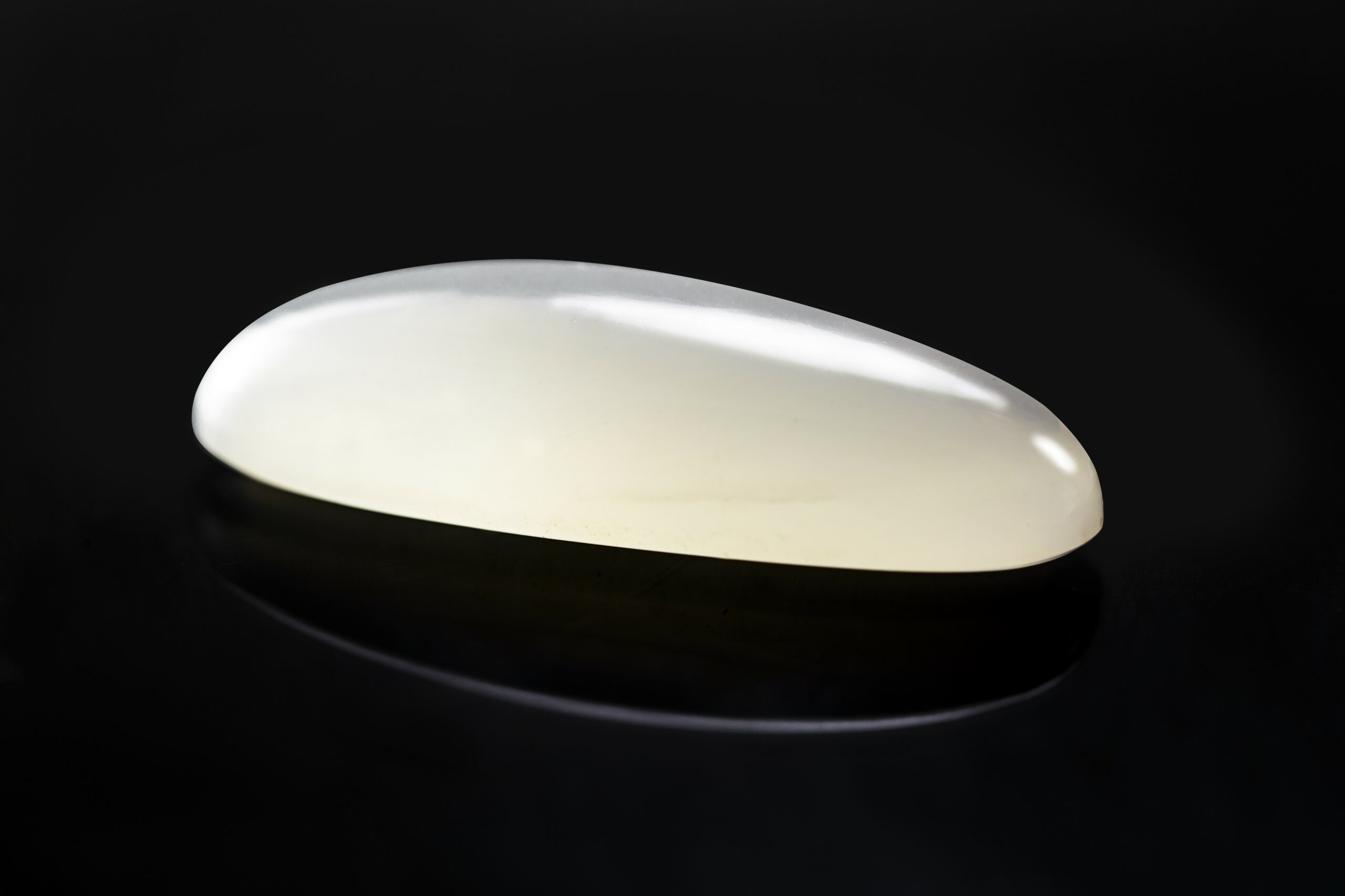 Showing a milky white moonstone in the context of moonstone gemstone meaning